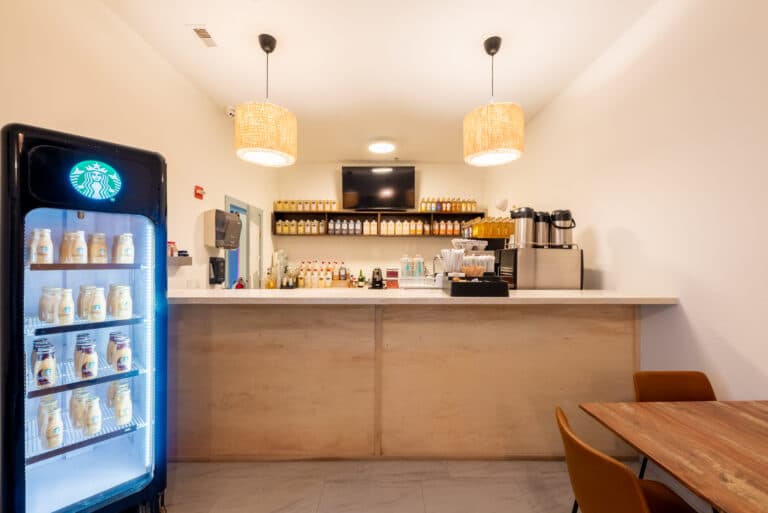 The Currents Café counter with a Starbucks fridge