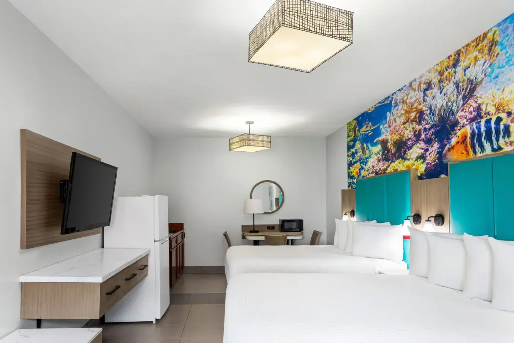 A two-room family suite with a full-size refrigerator